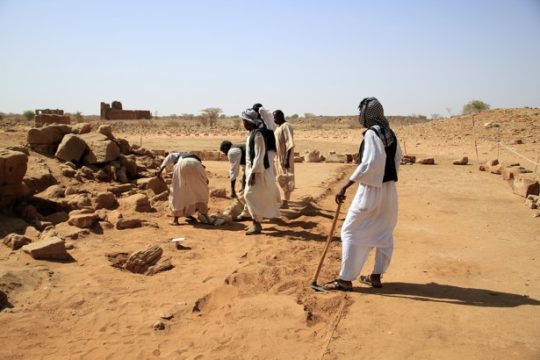 Sudanese workers excavating Temple 1200