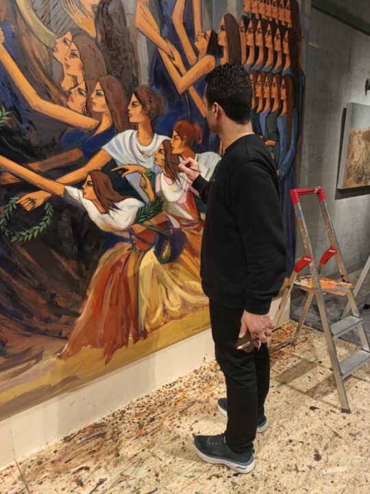 Alaa Awad beim Malen